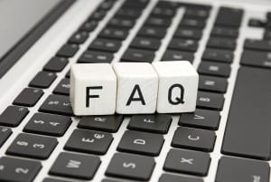 FAQ frequently asked questions sign symbol an a laptop keyboard